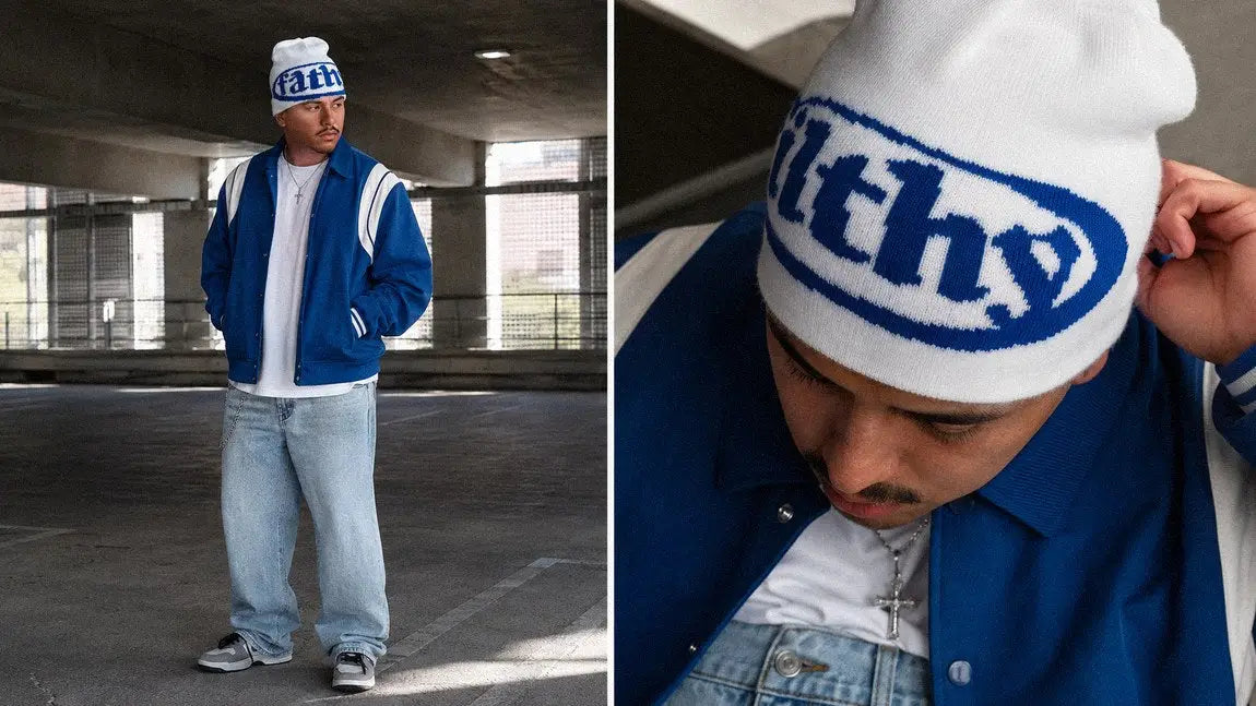 White and blue streetwear beanie with bold text creating a colour-block graphic balance