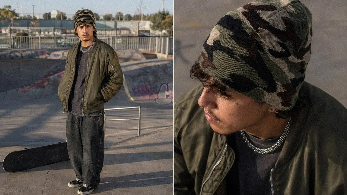 Camo streetwear beanie styled with an olive bomber jacket at a skatepark