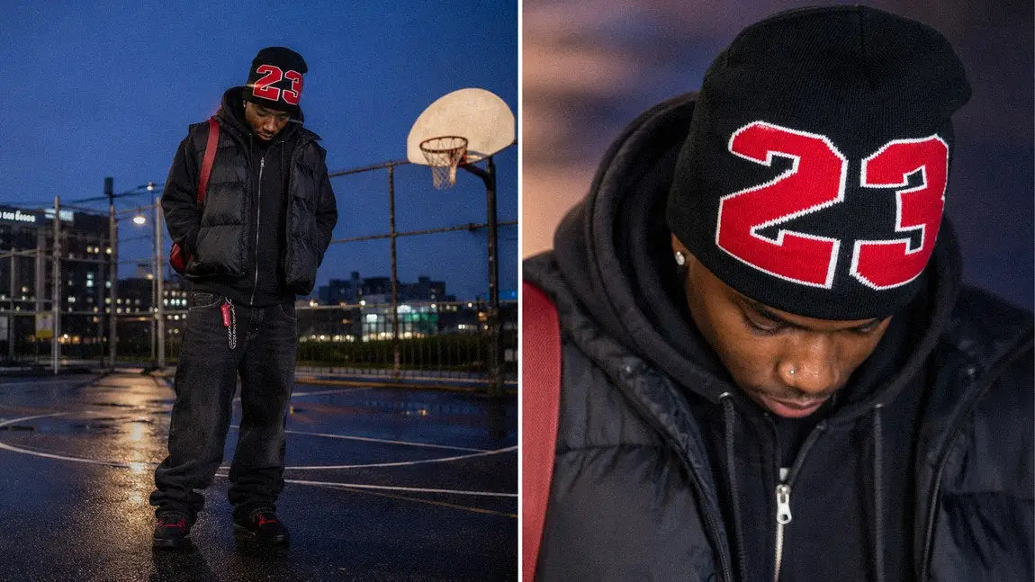 Streetwear beanie with a red jersey number worn with a black puffer vest
