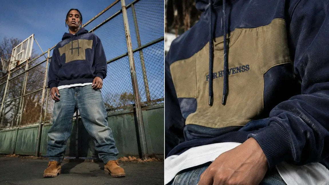 Navy and olive colorblock streetwear hoodie styled with wide jeans on a basketball court