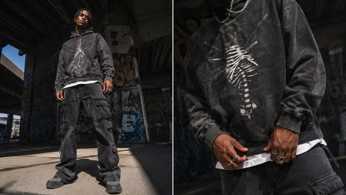Streetwear hoodie with an anatomical ribcage graphic styled under a graffiti-covered bridge