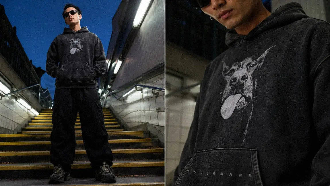 Oversized streetwear hoodie with a doberman graphic styled with black cargo pants