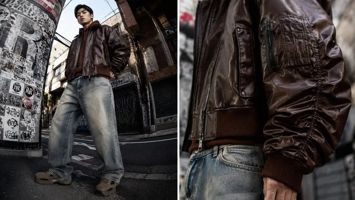 Dark brown leather streetwear jacket styled with light-wash jeans on a Tokyo street corner