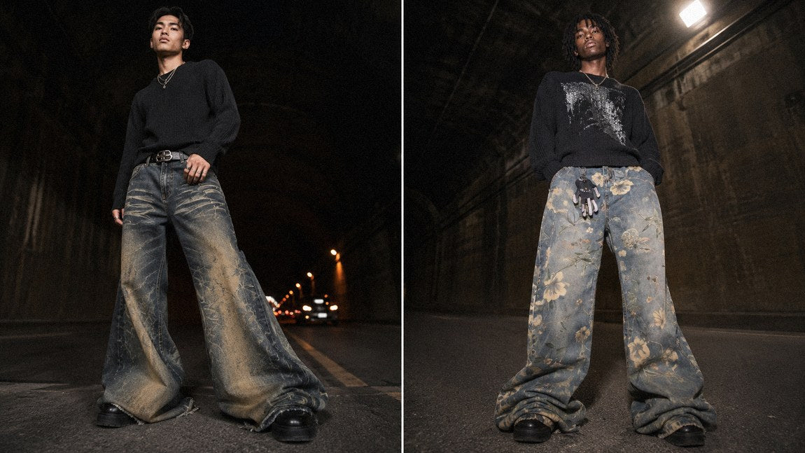 Extremely wide streetwear jeans with a muddy wash showing the full baggy silhouette