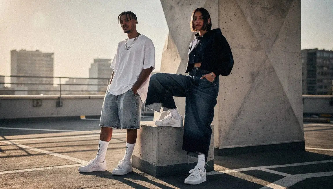 a man and a woman in streetwear jorts