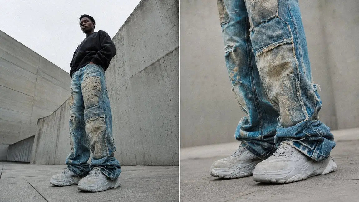 Distressed patchwork streetwear pants paired with chunky white sneakers