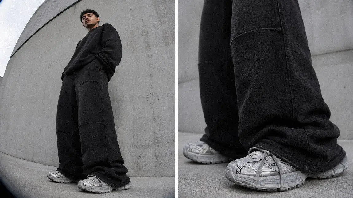 Wide-leg streetwear sweatpants with visible panel seams paired with an oversized crewneck