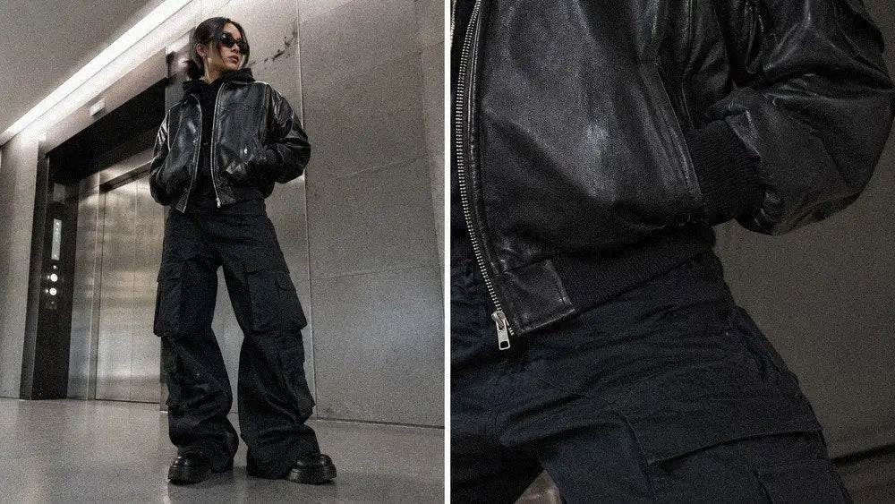 Cropped leather bomber jacket and cargo pants demonstrating cold-weather dark streetwear layering