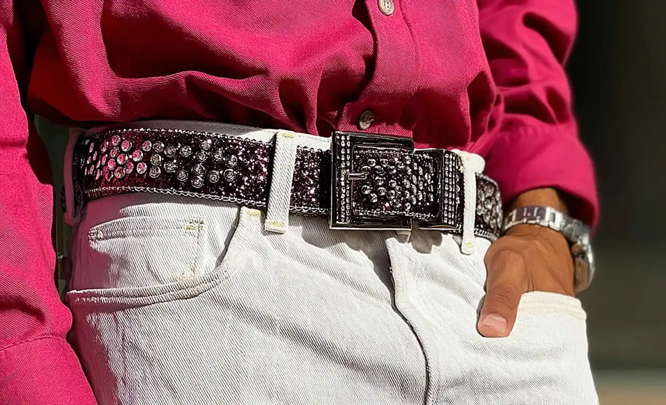 Rhinestone streetwear belt with a wide crystal buckle styled with light jeans.